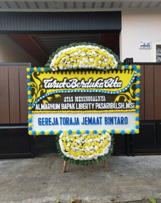 Papan Bunga Duka di Babakan Pasar