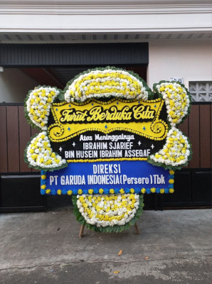 Papan Bunga Duka di Babakan Pasar